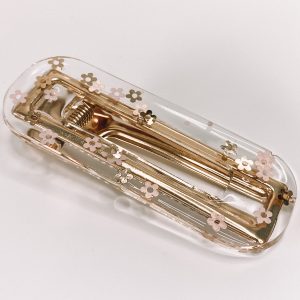 Barrette résine petites fleurs.