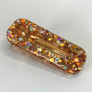 Barrette résine Polka dots gold.