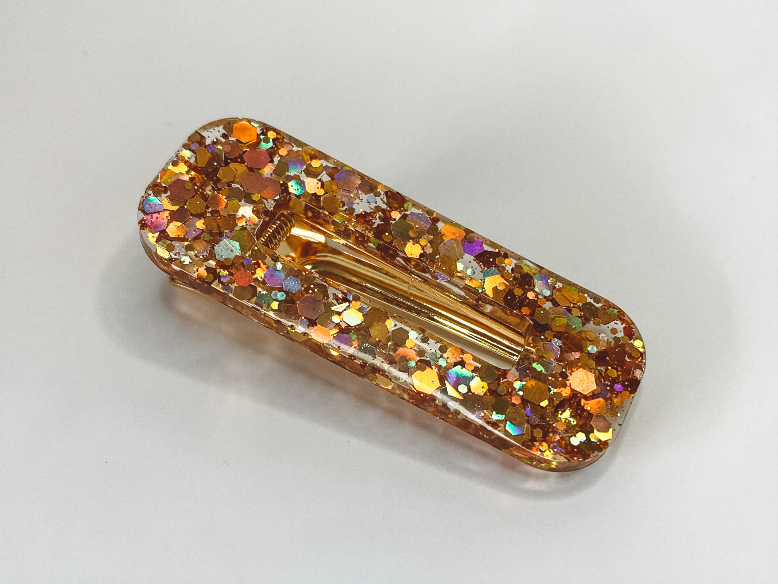 Barrette résine Polka dots gold.