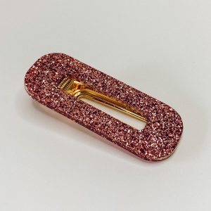 Barrette résine pailletée rose gold.
