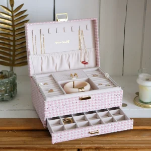 Boîte à bijoux Denise en pied-de-poule rose.