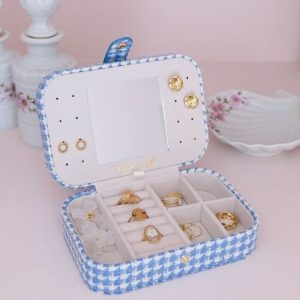 Boîte à bijoux de voyage Brigitte en pied-de-poule bleu.