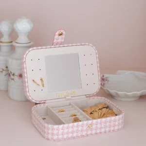Boîte à bijoux de voyage Brigitte en pied-de-poule rose.
