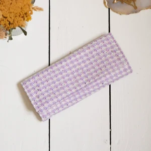 Pochette à bijoux Catherine en pied-de-poule mauve.