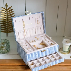 Boîte à bijoux Denise en pied-de-poule bleu.