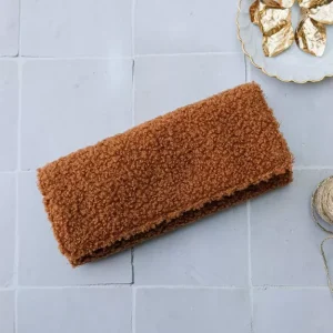 Pochette à bijoux Catherine en moumoute camel.