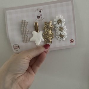 Lot de 4 barrettes « scintillantes dorées ».